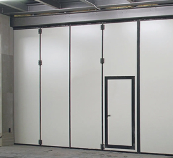 Pedestrian door option in commercial folding steel door